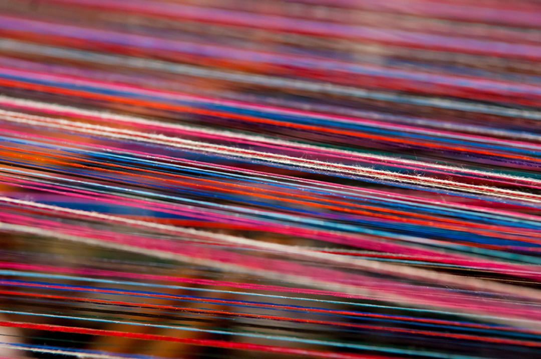 Image of strands of colourful yarn